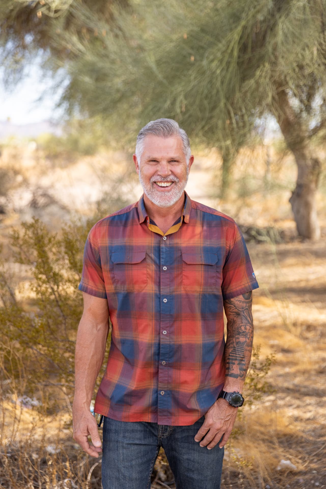Mike Oborn, owner of Full Deck Handyman, smiling outdoors